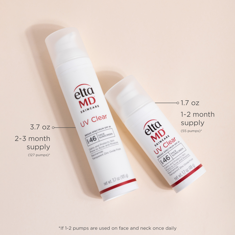 Two bottles of elta MD UV Clear sunscreen on a beige background