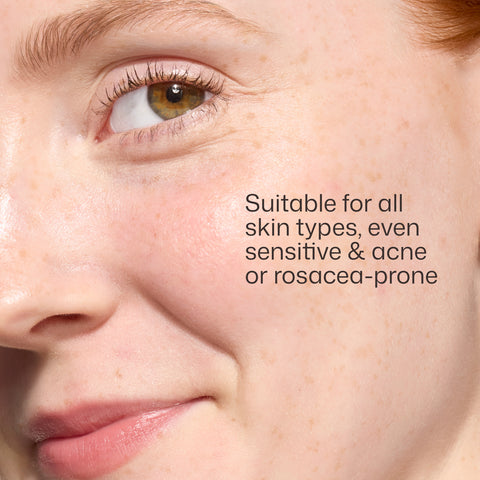 Close-up of a person's eye with text indicating suitability for various skin types.